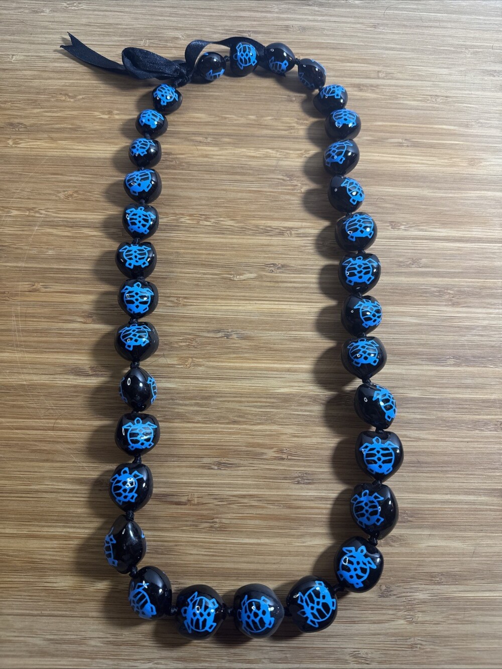 Hawaiian Kukui Nut Lei Blue Honu Sea Turtle Black Beads Ribbon Necklace